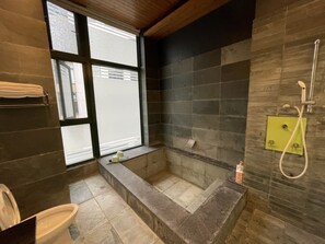 Quadruple Room, 2 Double Beds, Mezzanine | Bathroom | Separate bathtub and shower, spring water bathtub, rainfall showerhead - Quan Jia Hot Spring B&B (Jiaoxi)