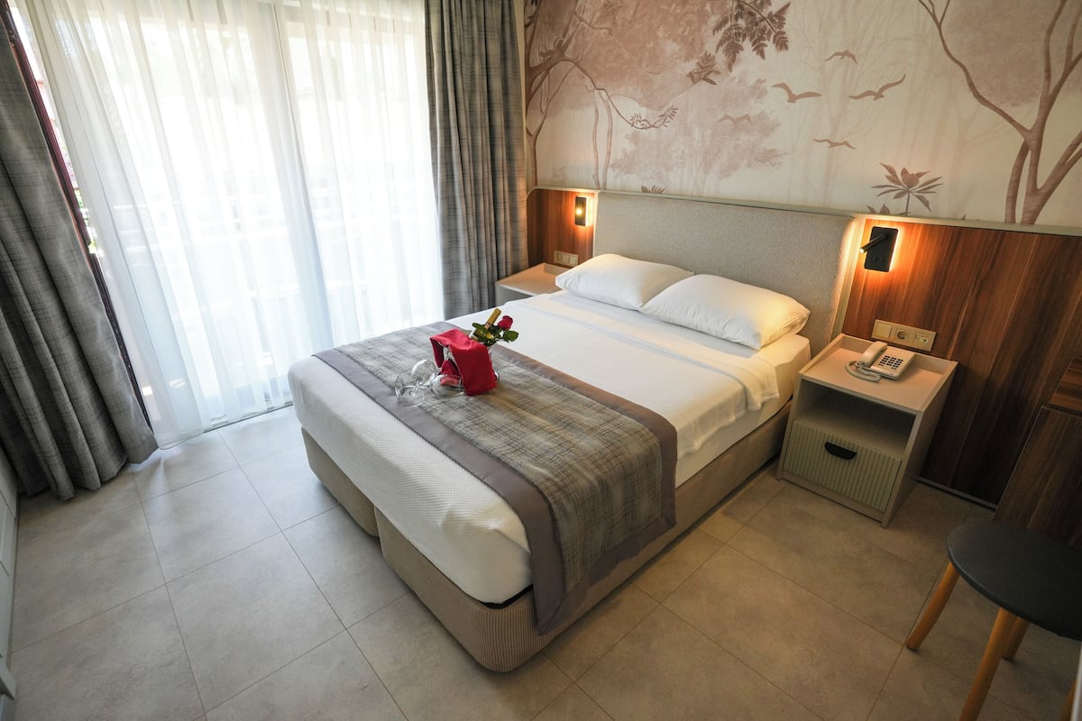 Standard Double or Twin Room | Minibar, iron/ironing board, bed sheets