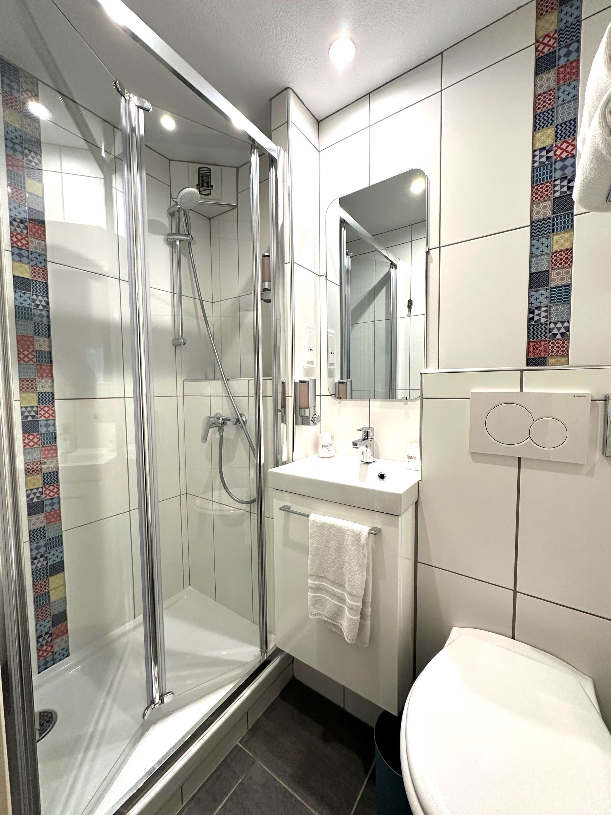 business room | bathroom | eco-friendly toiletries, hair dryer, towels, soap