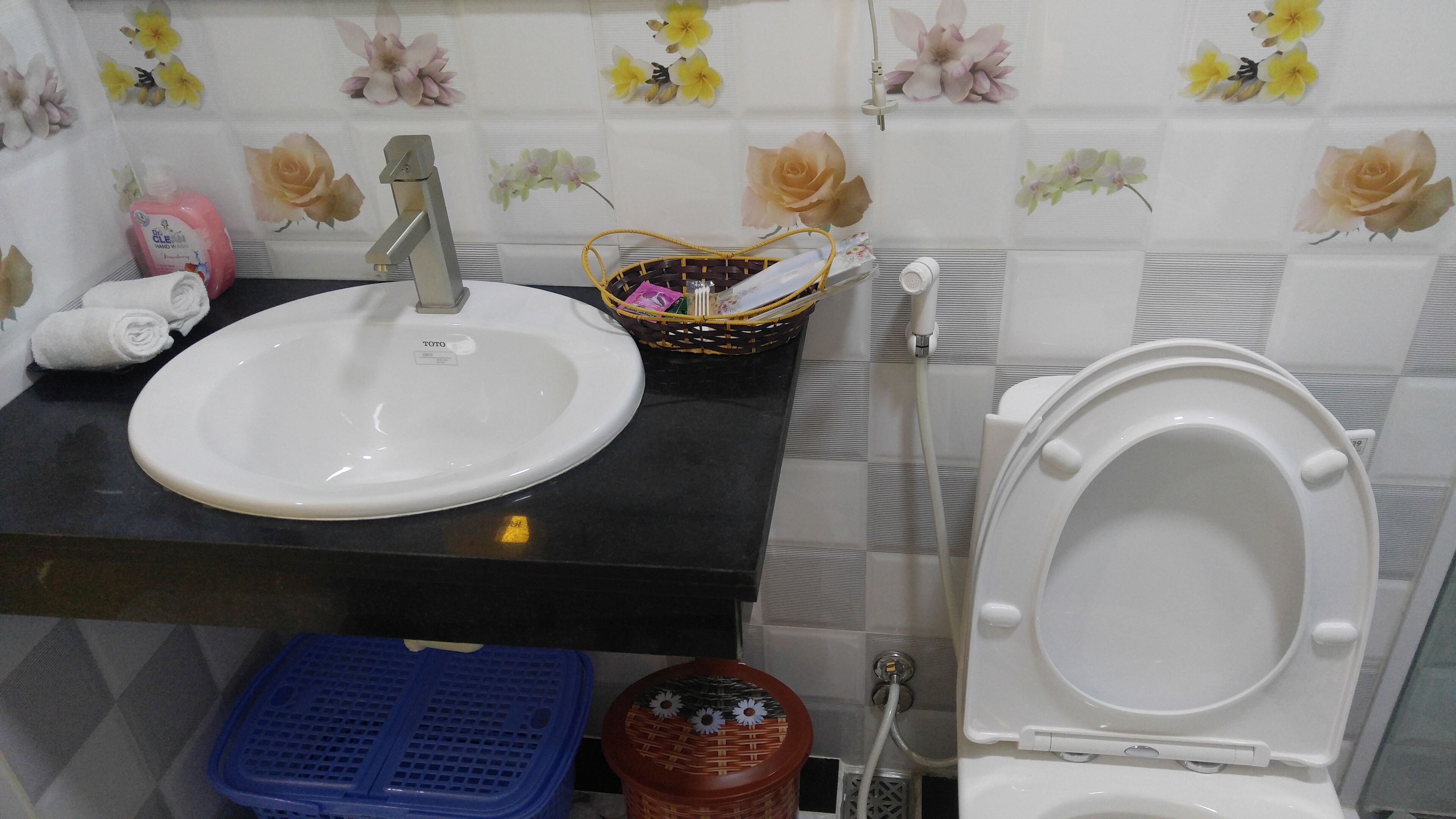 family room, balcony, city view | bathroom | shower, designer toiletries, hair dryer, slippers