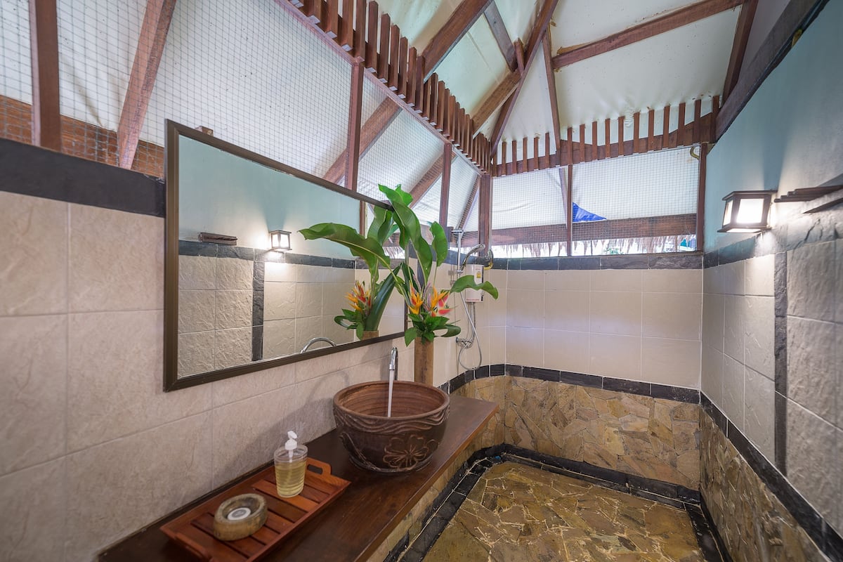 earth house  | bathroom | shower, bidet, towels, soap