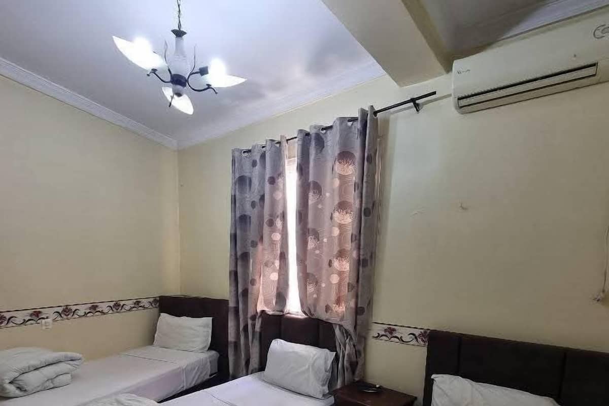 Family Room | Premium bedding, desk, free WiFi