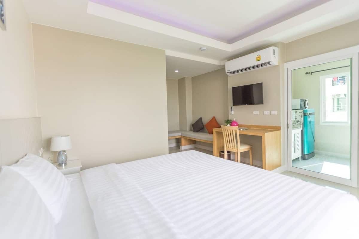 Deluxe Room | Een bureau, verduisterende gordijnen, gratis wifi, beddengoed