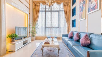 Luxury Loft, 3 Bedrooms | Living area | LCD TV