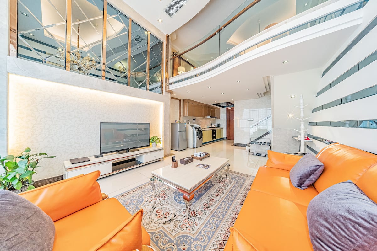 Loft superluxo, 1 cama Queen | Área de estar | TV LCD