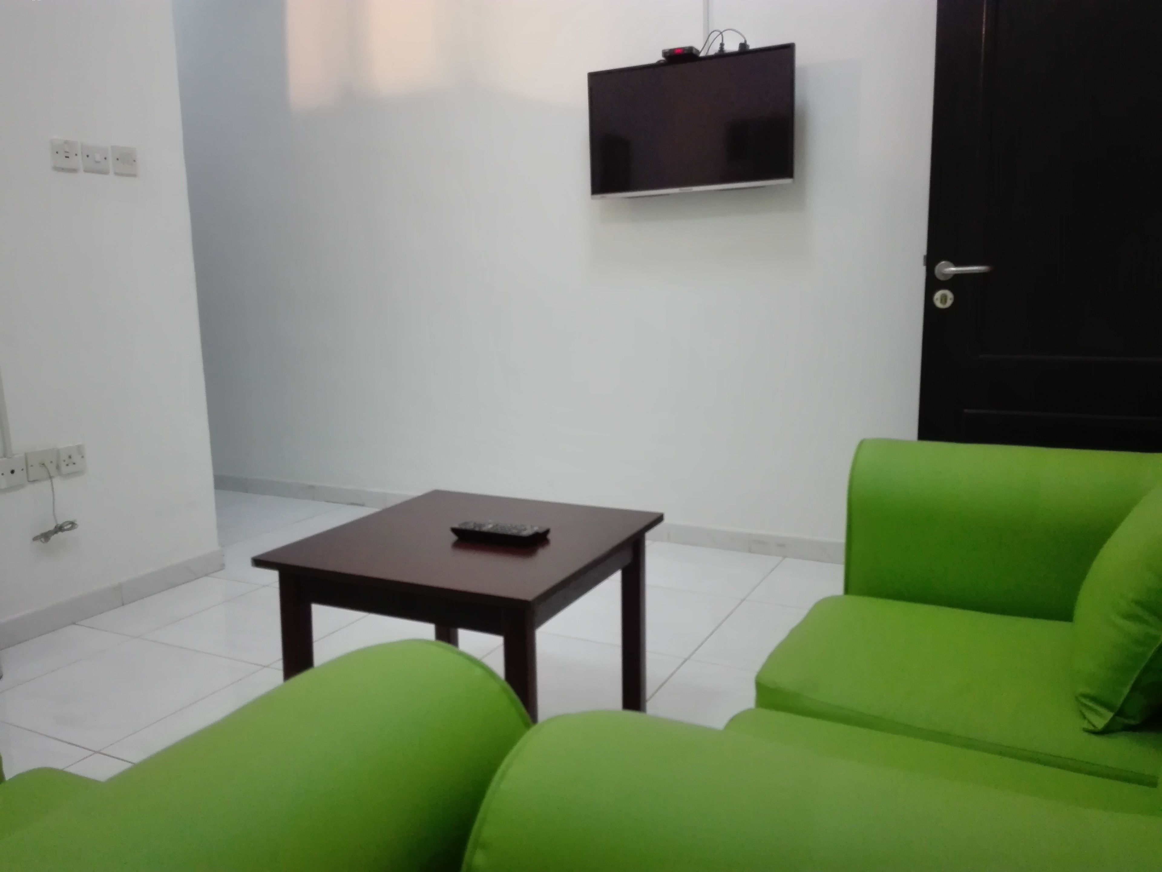 deluxe studio, 1 bedroom, beach view | living room | 32-inch led tv with satellite channels, tv