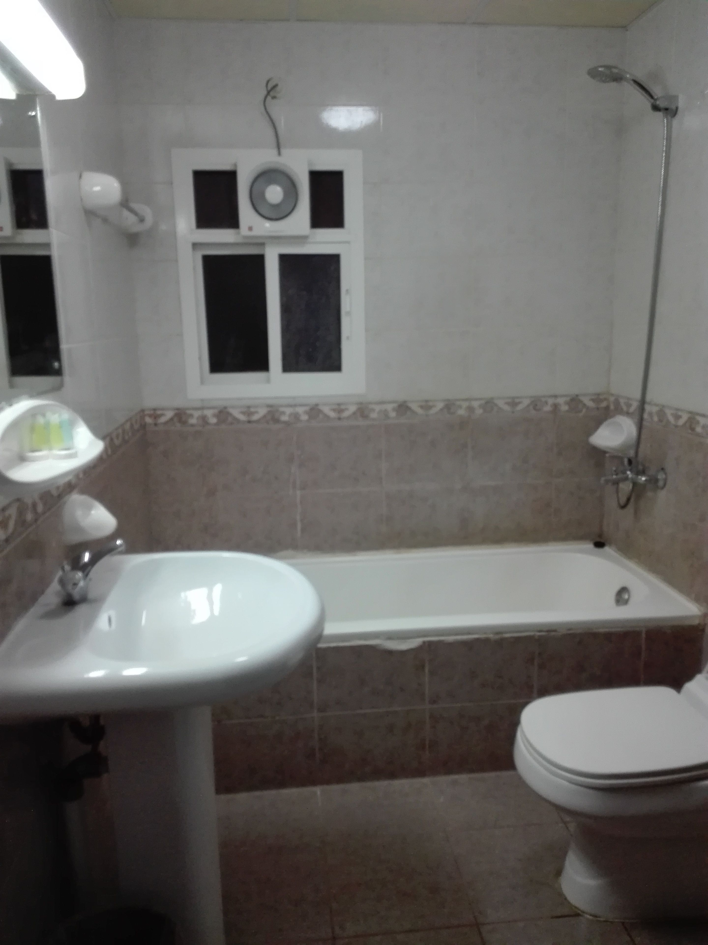 deep-soaking bathtub, free toiletries, hair dryer, towels