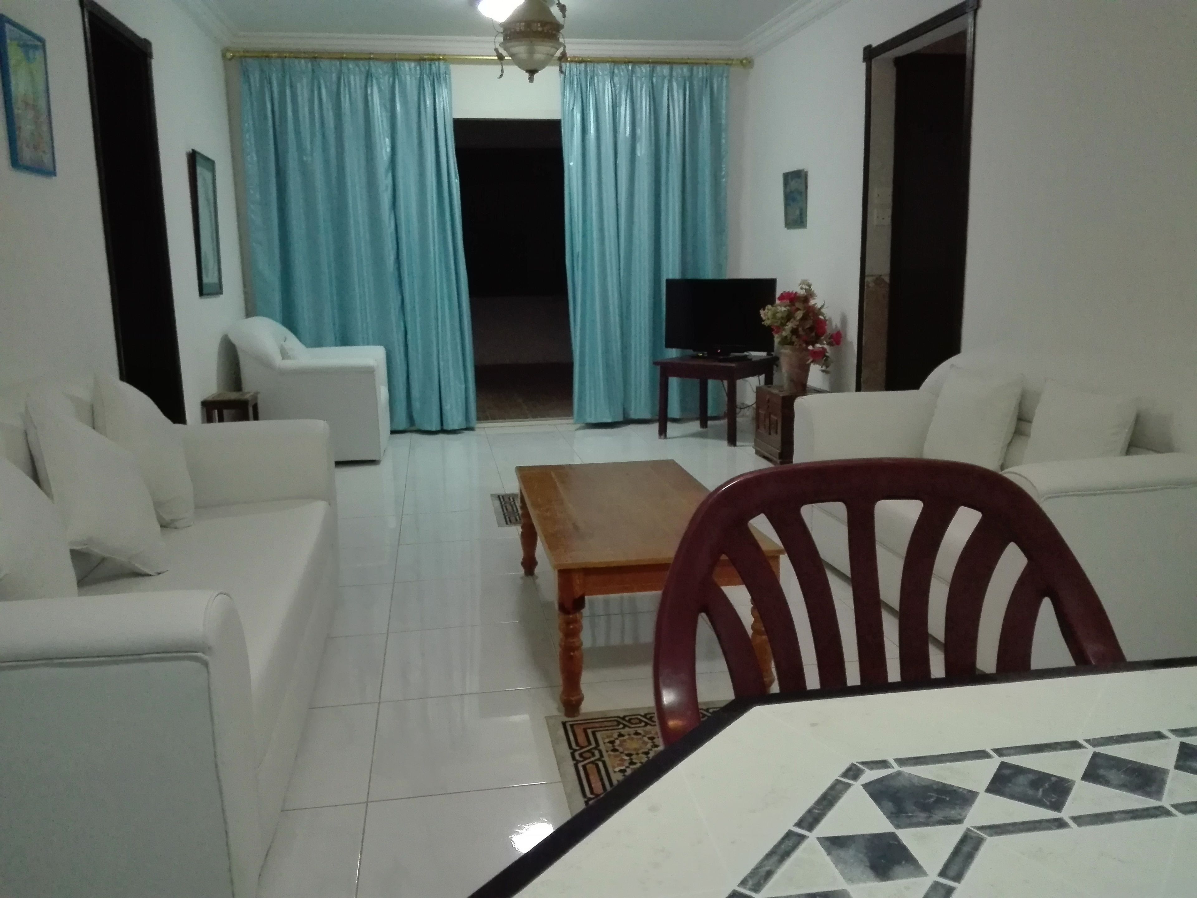 villa, 4 bedrooms, beach view | living area | 32-inch led tv with satellite channels, tv