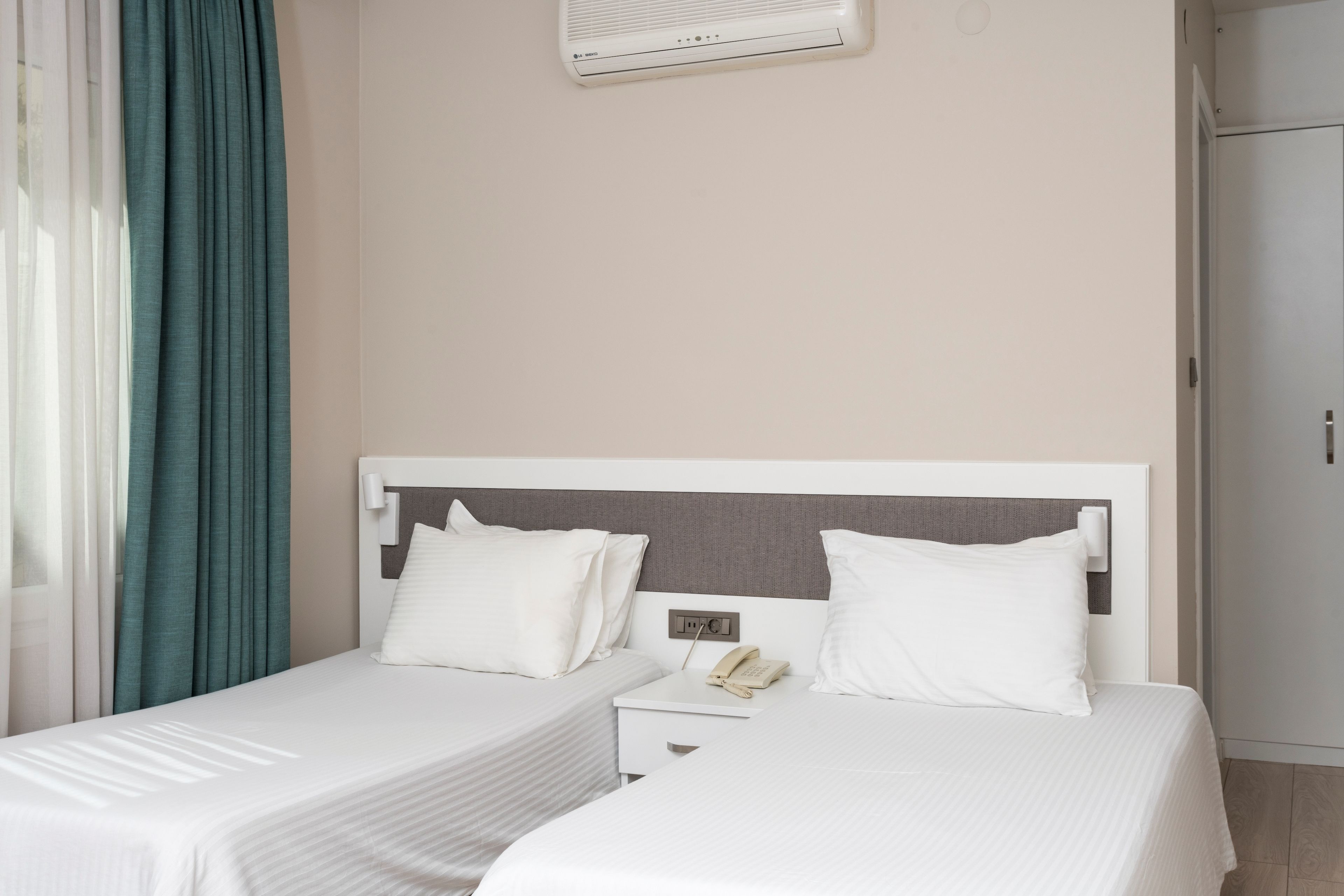 superior twin room, fireplace | in-room safe, desk, laptop workspace, free wifi