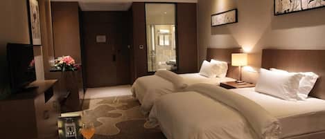 Ropa de cama de alta calidad y minibar