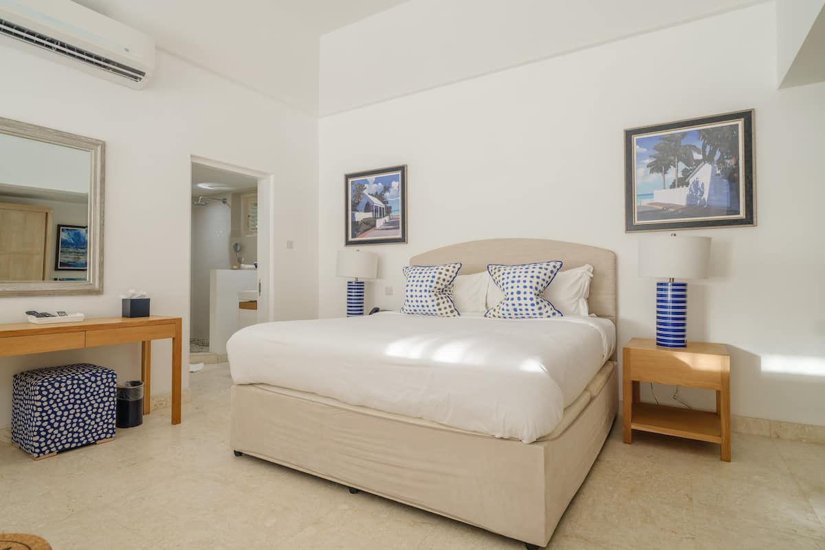 junior suite, 1 king bed, ocean view | 2 bedrooms, premium bedding, minibar, in-room safe