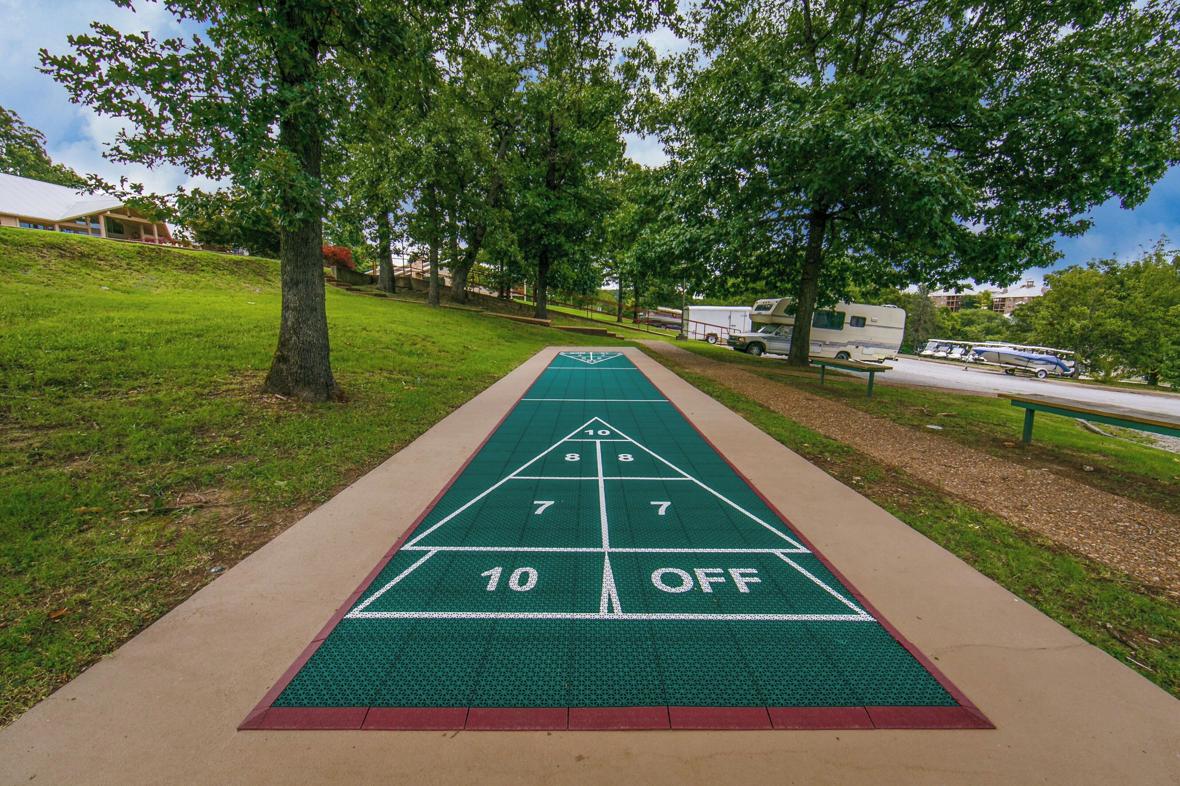 A shuffleboard court with numbered scoring areas and an 'OFF' zone.