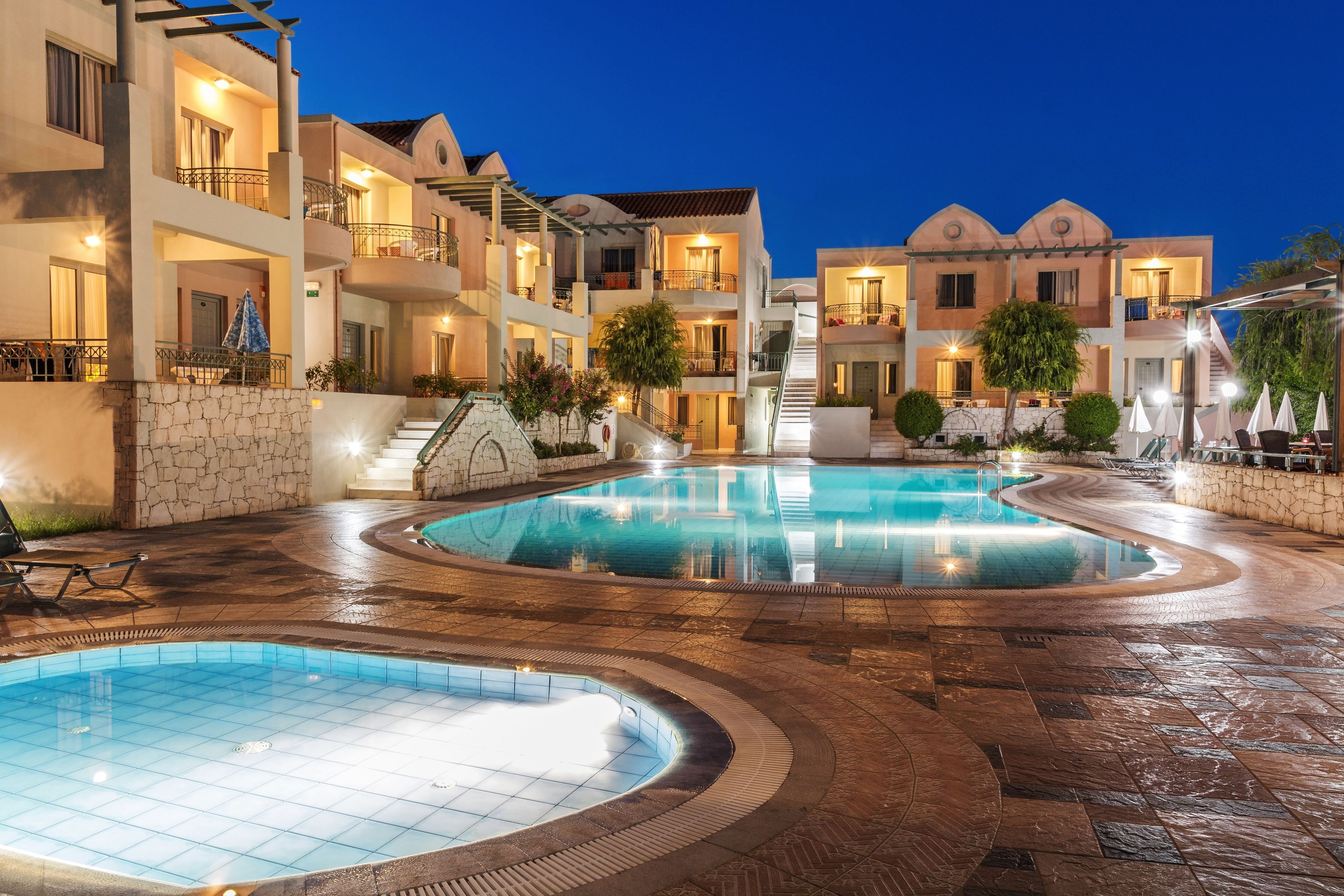 Seasonal outdoor pool, open 10:00 AM to 6:00 PM, pool umbrellas