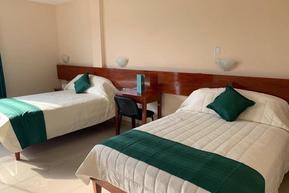 family room, 2 double beds, air conditioning, city view | view from room