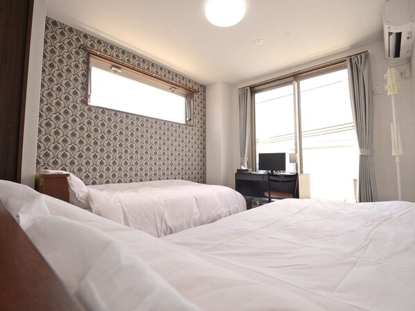 Chambre avec lits jumeaux