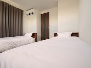 Chambre avec lits jumeaux