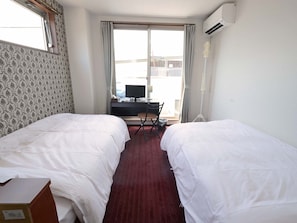 Chambre avec lits jumeaux