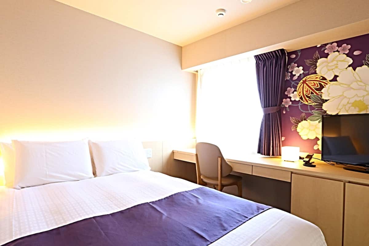 In-room safe, desk, blackout curtains, iron/ironing board (on request)