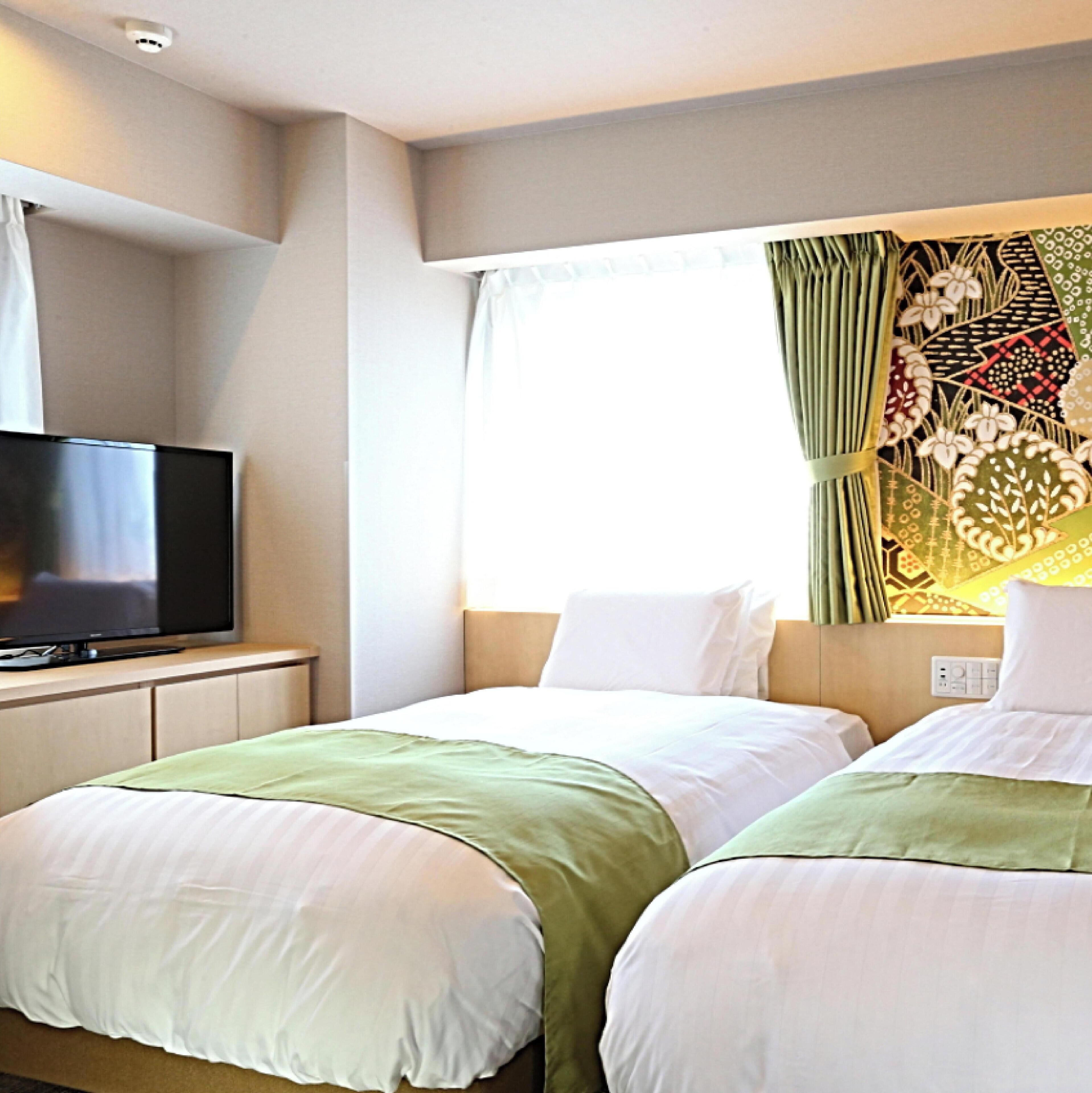 Twin Room, Non Smoking | In-room safe, desk, blackout drapes, iron/ironing board