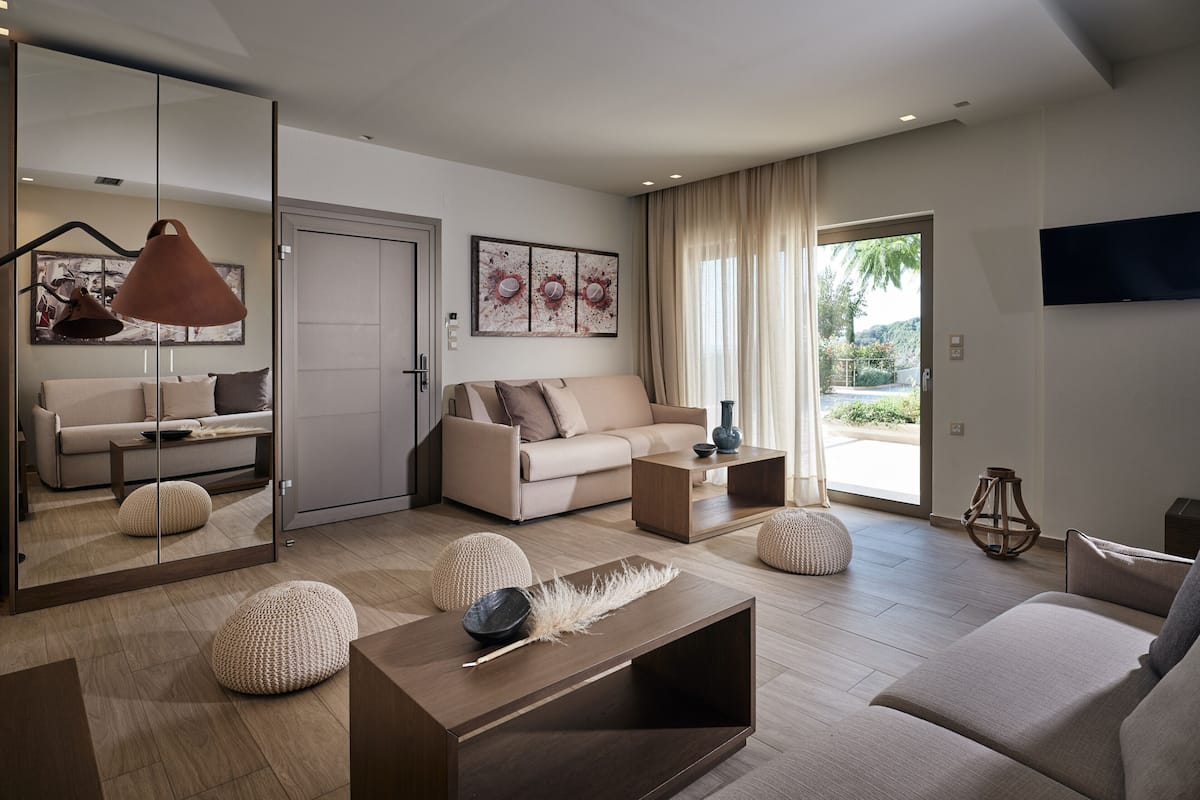 Grand Suite, Sea View | Living area | Flat-screen TV