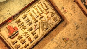 A framed nautical collection with ship models and maritime instruments. - Tongadale Hotel (Portree)