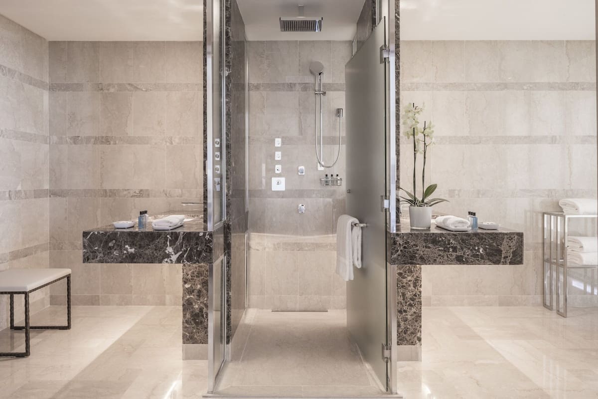 separate bathtub and shower, deep-soaking bathtub, free toiletries