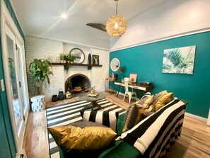 Smart TV, fireplace, books, video library