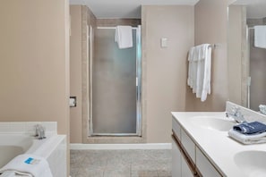 Shower, jetted tub, towels