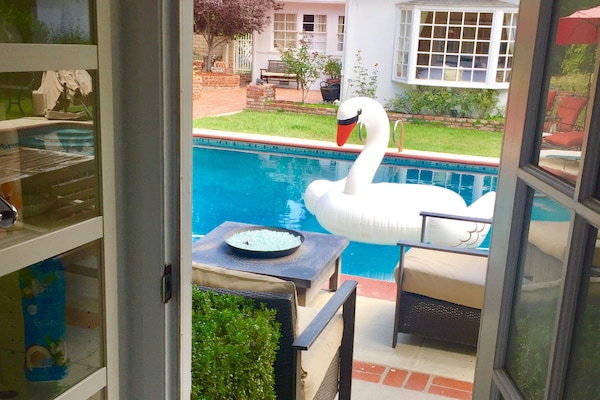 Looking out to Pool through Bathroom door.