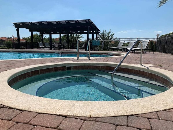 Outdoor pool, a heated pool, pool loungers