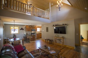 Älytelevisio, takka, DVD-soitin, kirjoja