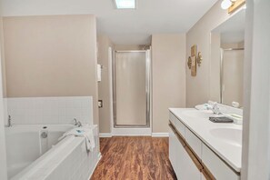 Shower, jetted tub, towels