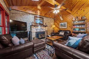 Smart TV, chimenea, reproductor de DVD y tenis de mesa 