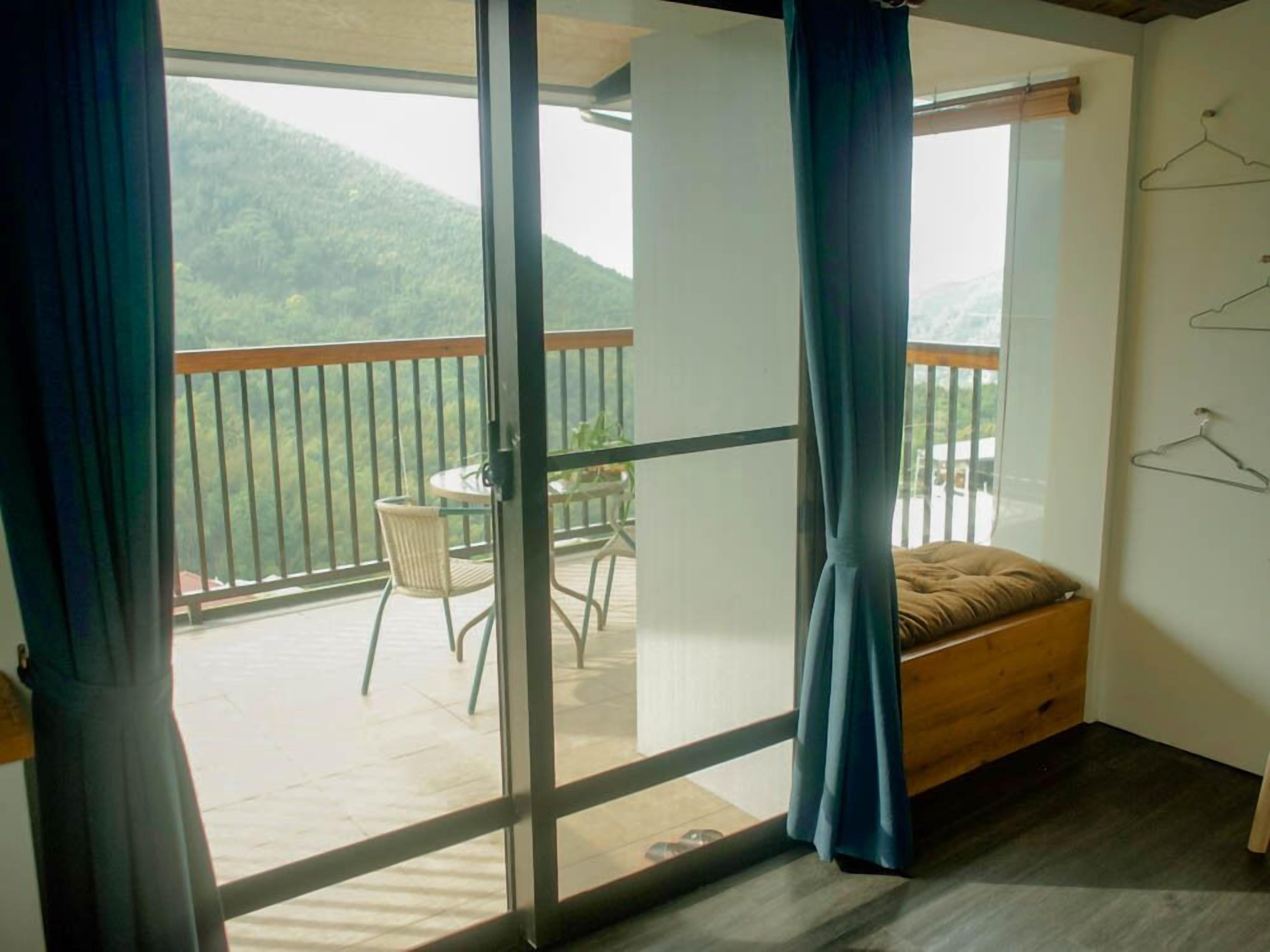 Comfort Double Room, Patio, Mountain View (Room Dec.) | Individually decorated, individually furnished, desk, blackout curtains