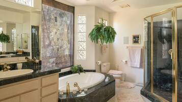 Bathtub, hair dryer, towels, soap