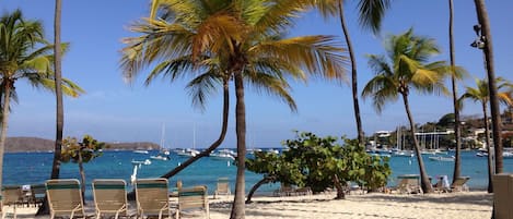 On the beach, sun loungers, beach towels