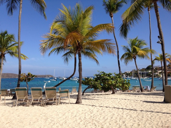 On the beach, sun loungers, beach towels