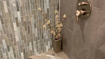 Combined shower/tub, hair dryer, towels, soap