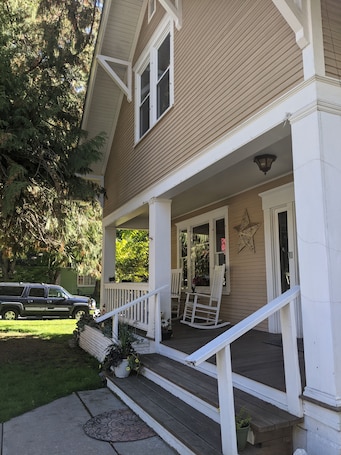 Exterior detail. Walking distance everywhere, yard, front porch and hot tub!