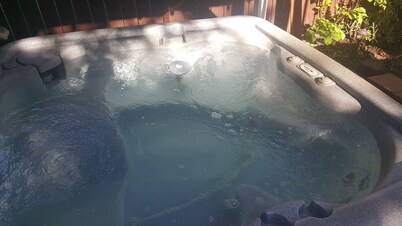 Walking distance everywhere, yard, front porch and hot tub!