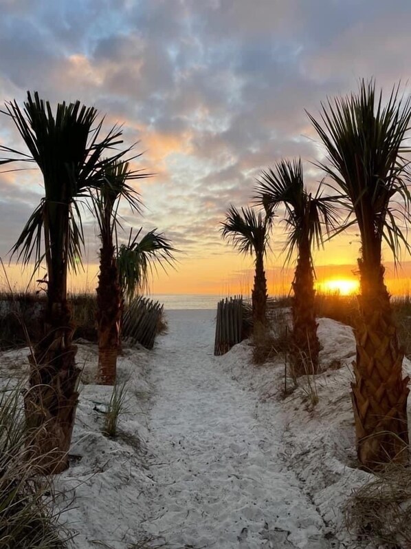 On the beach, sun loungers, beach towels
