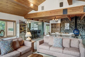 Flat-screen TV, fireplace, ping pong, books