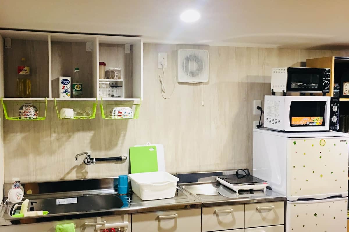 standard japanese style room | private kitchen | fridge, microwave, stovetop, rice cooker