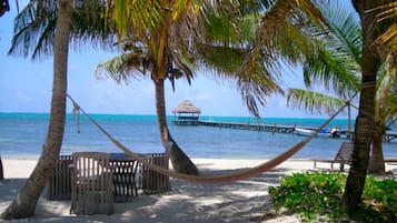 On the beach, sun loungers, beach towels