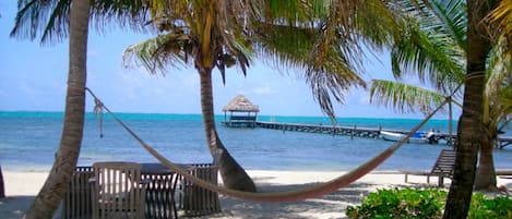 On the beach, sun loungers, beach towels