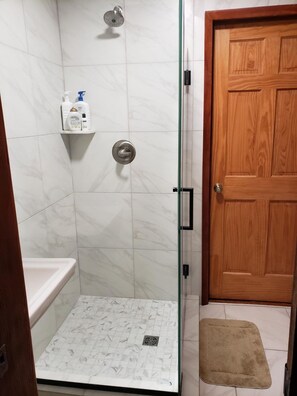 Bathtub, hair dryer, towels, soap