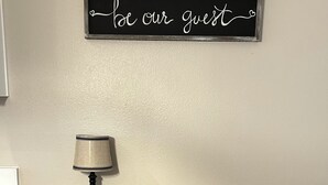 A wooden desk with a lamp and a decorative sign above it. - Fun Under The Sun, Condo 3: You Need a St. George Get-away! (St George)