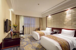 Ropa de cama de alta calidad, minibar, escritorio y cortinas blackout 