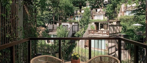 Suite, 2 Bedrooms, Garden View with 1 Bathroom | 1 bedroom, free minibar items, in-room safe, laptop workspace