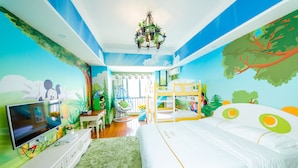 A child's bedroom with a bunk bed, a television, and a mural on the wall. - Lavender Apartment -Wanda Branch (Guangzhou)
